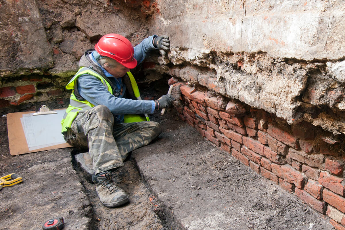 Archaeologist excavating The Curtain Playhouse