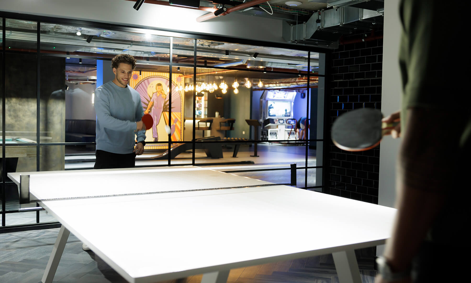 Residents in the Games Room at The Stage Apartments in Shoreditch