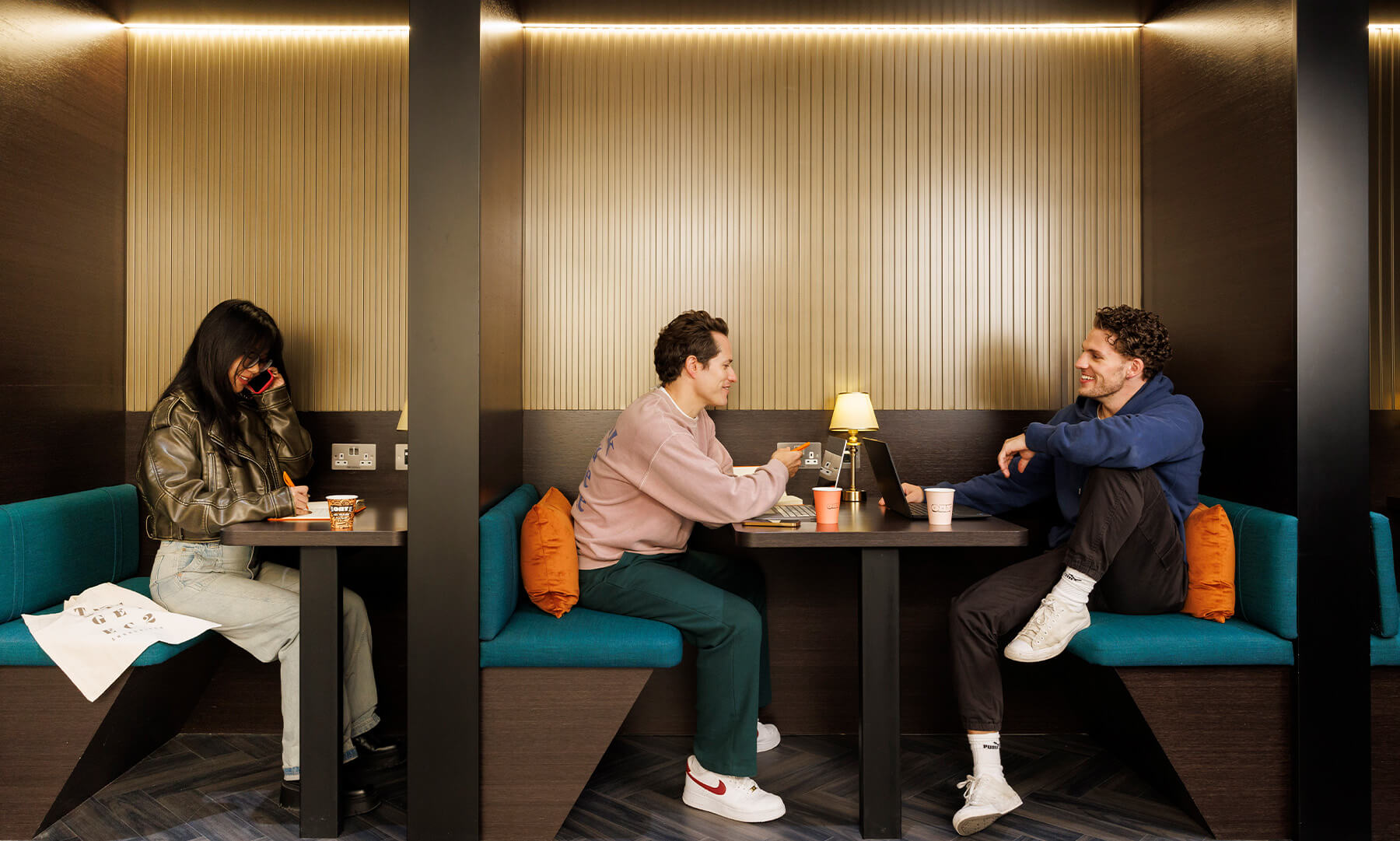 Residents in the co-working suite at The Stage Apartments in Shoreditch