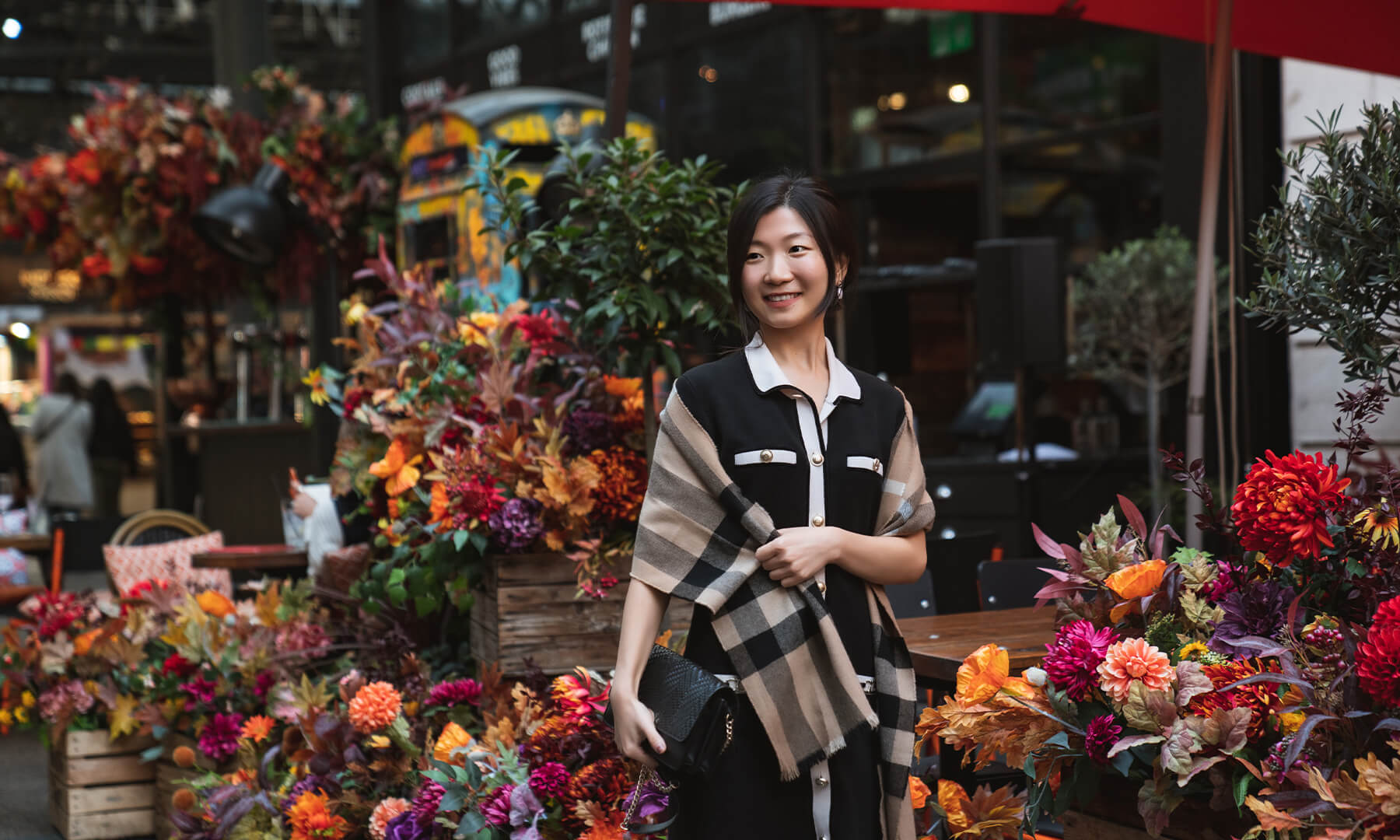 China sales representative Mia in Spitalfields Market, East London