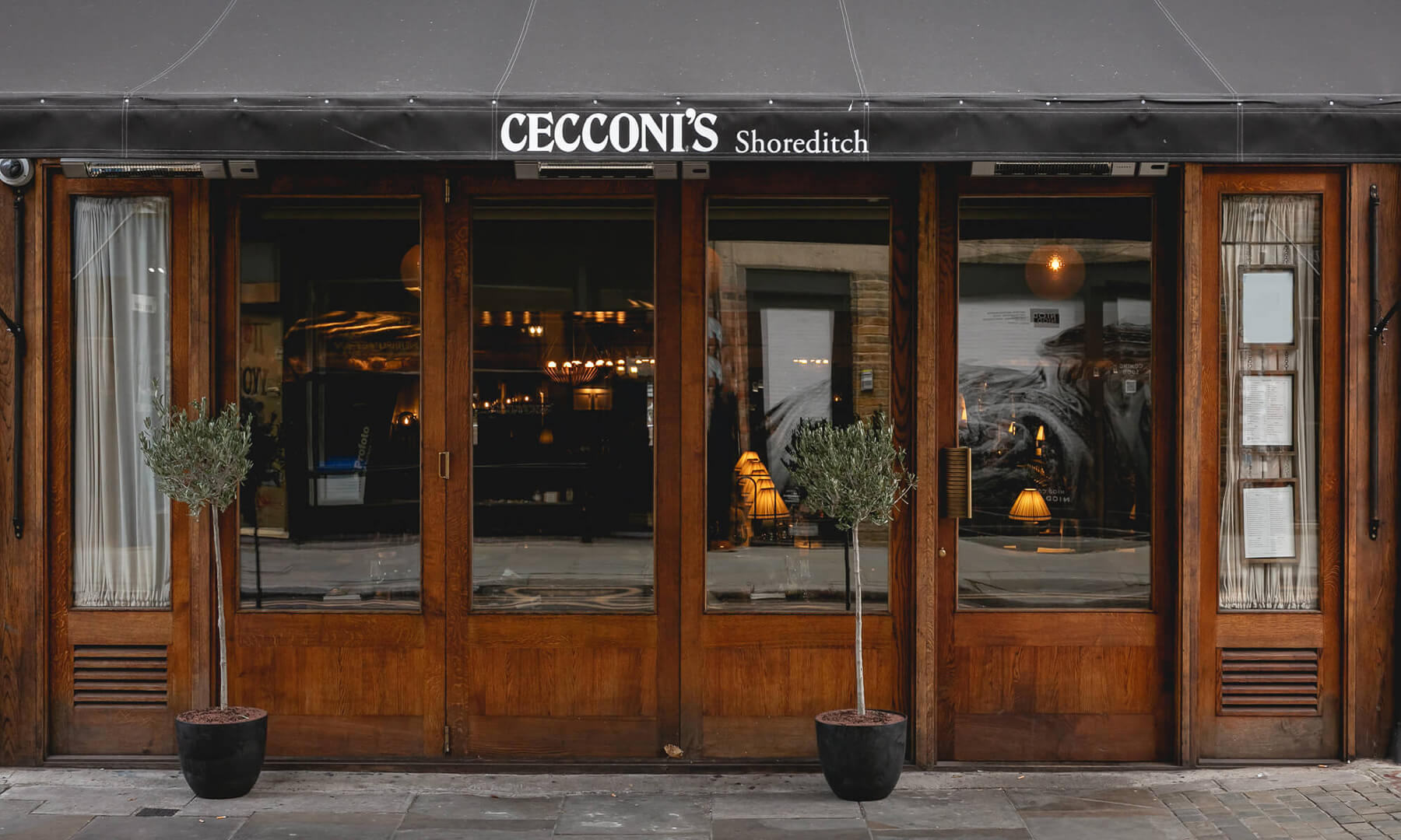 The exterior of Cecconi's Shoreditch, a restaurant with refined Italian dining in East London.