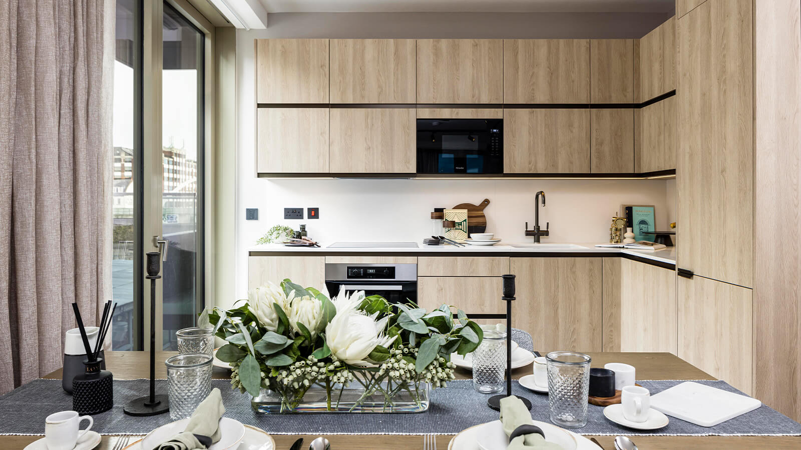 Kitchen at a two-bedroom apartment at The Stage, ©Galliard Homes.