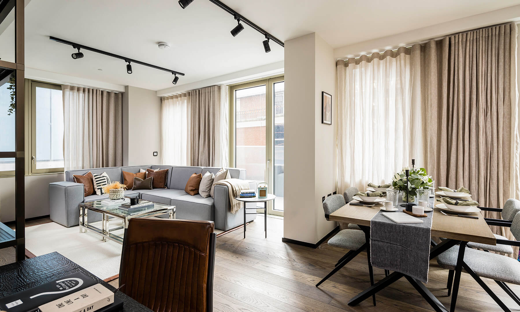 Open-plan living and dining room at a two-bedroom apartment at The Stage, ©Galliard Homes.